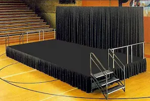 Portable indoor stage rental setup in Houston TX by Turn Key Event Rentals