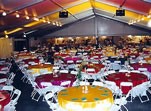 Banquet tables and chair arrangements setup for waterfront reception in Clear Lake